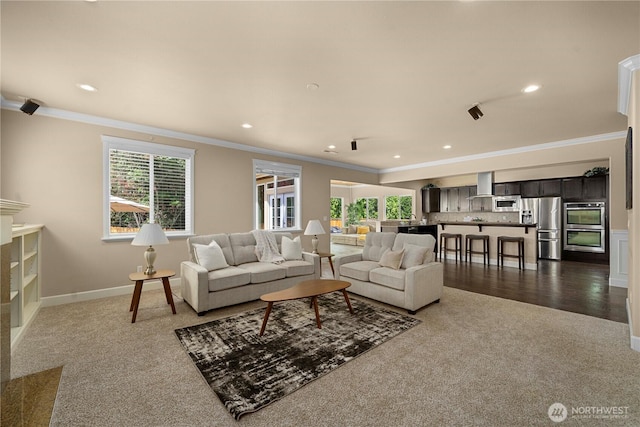 21230 SE 258th Pl, Maple Valley, WA 98038 - living room featuring dark carpet, crown molding, and recessed lighting