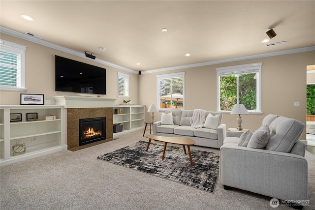 21230 SE 258th Pl, Maple Valley, WA 98038 - living room with crown molding, a fireplace with flush hearth, carpet floors, and recessed lighting