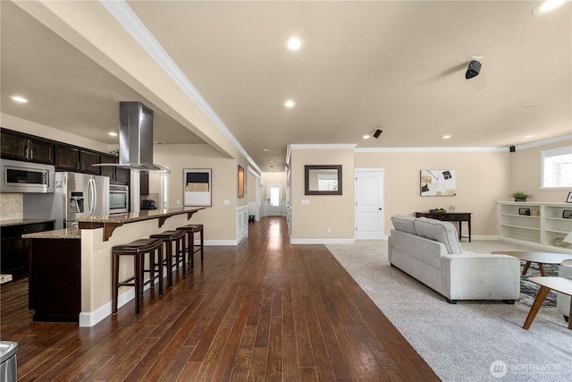 21230 SE 258th Pl, Maple Valley, WA 98038 - living area featuring dark wood-style floors, crown molding, and recessed lighting