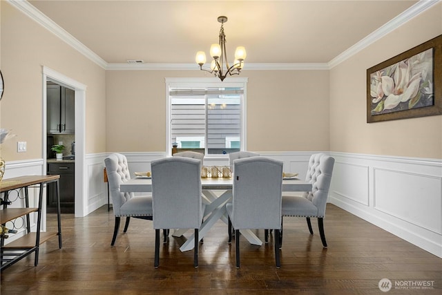21230 SE 258th Pl, Maple Valley, WA 98038 - dining area with a chandelier, ornamental molding, wainscoting, and dark wood-style flooring