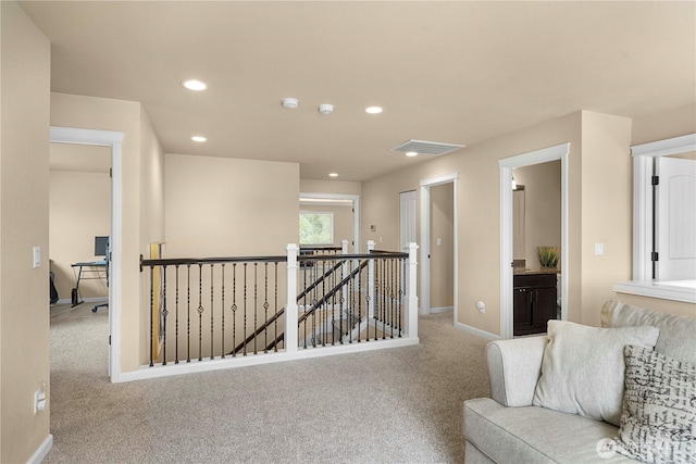 21230 SE 258th Pl, Maple Valley, WA 98038 - living area featuring an upstairs landing, carpet, recessed lighting, and a desk