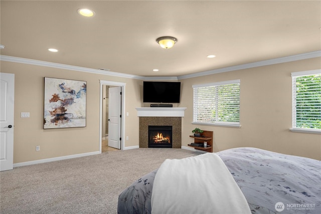 21230 SE 258th Pl, Maple Valley, WA 98038 - carpeted bedroom with ornamental molding, recessed lighting, and a tile fireplace