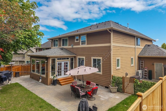 21230 SE 258th Pl, Maple Valley, WA 98038 - back of house featuring a patio, a fenced backyard, and french doors