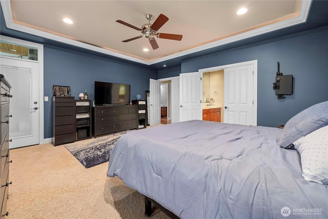 8003 113th Street Ct E, Puyallup, WA 98373 - carpeted bedroom featuring a raised ceiling, recessed lighting, ensuite bath, and a ceiling fan