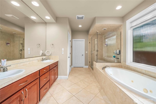 8003 113th Street Ct E, Puyallup, WA 98373 - bathroom with a tub with jets, a stall shower, tile patterned flooring, double vanity, and recessed lighting