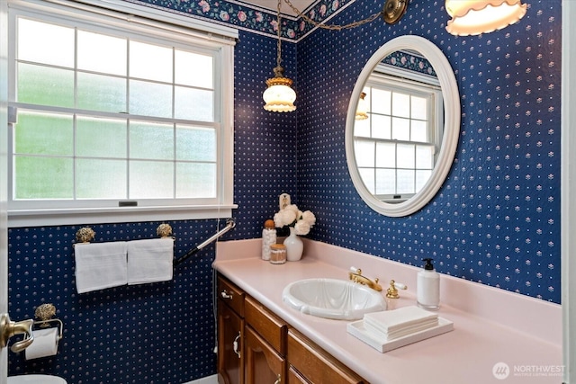 1175 SW Lopez Dr, Oak Harbor, WA 98277 - bathroom with vanity and wallpapered walls