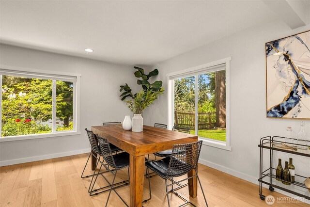2441 NE 182nd St, Shoreline, WA 98155 - dining area with healthy amount of natural light, recessed lighting, and light wood finished floors