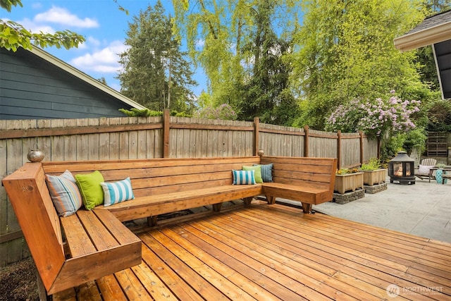 2441 NE 182nd St, Shoreline, WA 98155 - wooden terrace with a patio area and a fenced backyard