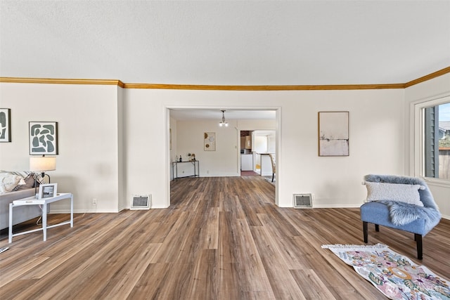 2718 N Alder St, Tacoma, WA 98407 - sitting room featuring ornamental molding and wood finished floors