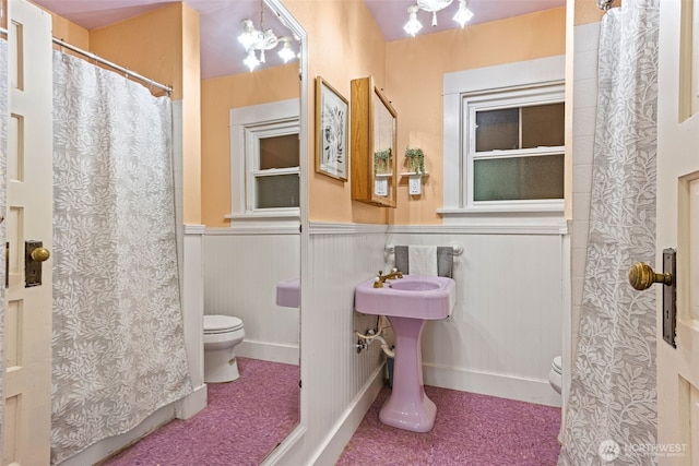 2718 N Alder St, Tacoma, WA 98407 - full bath with wainscoting and a shower with curtain