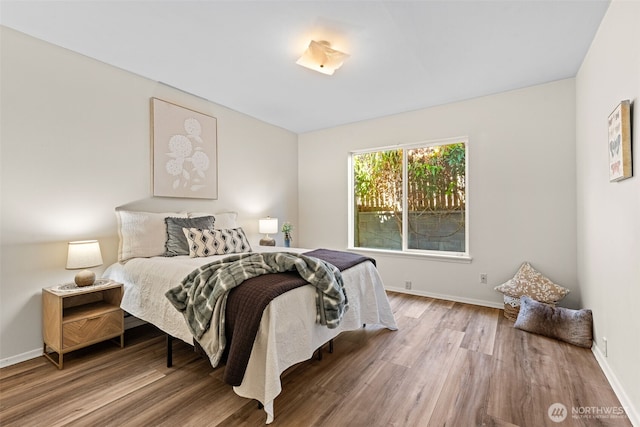2718 N Alder St, Tacoma, WA 98407 - bedroom featuring wood finished floors and baseboards