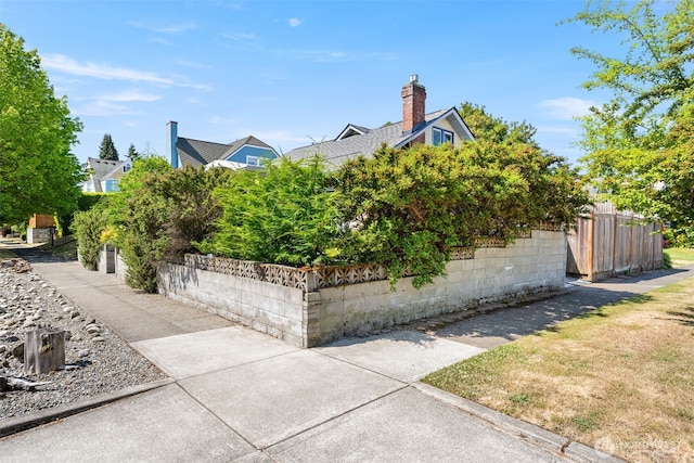 2718 N Alder St, Tacoma, WA 98407 - view of home's exterior featuring a chimney