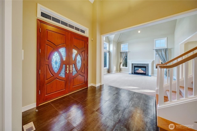 14329 SE 84th Ct, Newcastle, WA 98059 - foyer with stairs and a glass covered fireplace