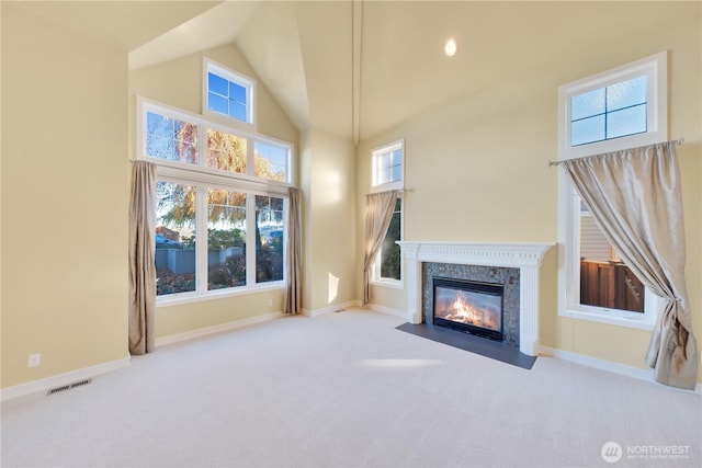 14329 SE 84th Ct, Newcastle, WA 98059 - unfurnished living room featuring carpet floors, a fireplace, high vaulted ceiling, and plenty of natural light