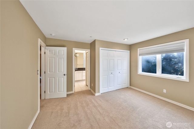 14329 SE 84th Ct, Newcastle, WA 98059 - unfurnished bedroom featuring light colored carpet, a closet, and ensuite bathroom