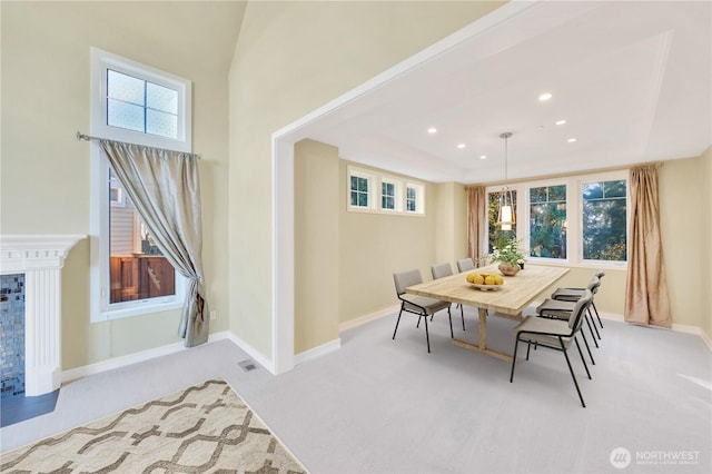 14329 SE 84th Ct, Newcastle, WA 98059 - dining space with carpet, a raised ceiling, recessed lighting, and a fireplace