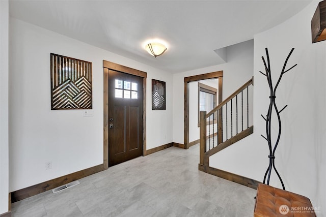 17325 Topaz Loop SE, Yelm, WA 98597 - entrance foyer with baseboards and stairway