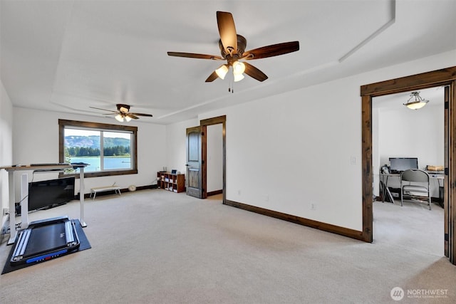 17325 Topaz Loop SE, Yelm, WA 98597 - living area featuring ceiling fan, light carpet, and a desk