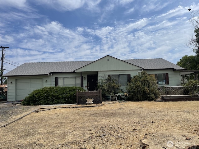802 Lindberg Ln, Moses Lake, WA 98837 - ranch-style house with an attached garage and a shingled roof