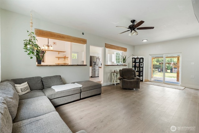 253 Kruger Rd Unit B, Onalaska, WA 98570 - living area with ceiling fan and wood finished floors