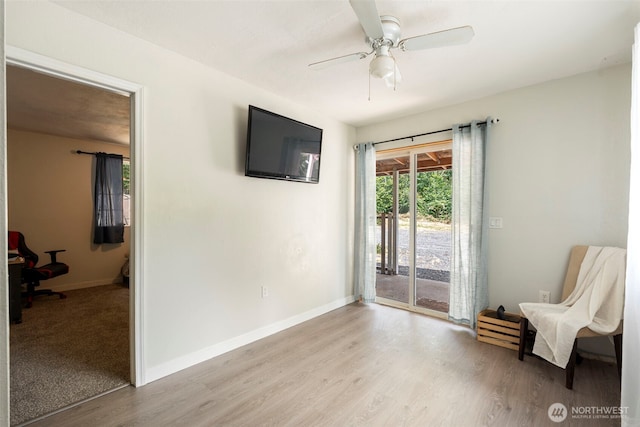 253 Kruger Rd Unit B, Onalaska, WA 98570 - sitting room featuring light wood-style floors and a ceiling fan