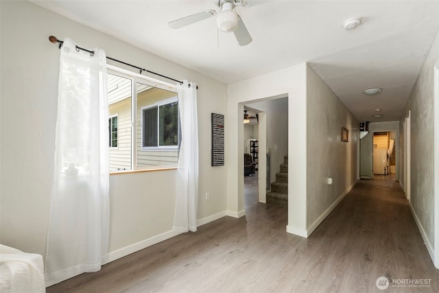 253 Kruger Rd Unit B, Onalaska, WA 98570 - hallway featuring wood finished floors and stairs