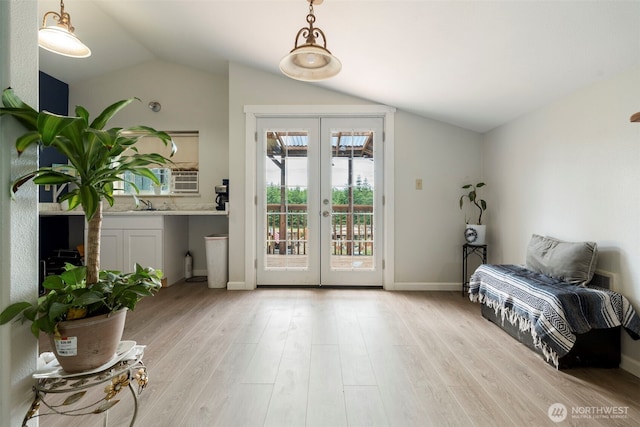 253 Kruger Rd Unit B, Onalaska, WA 98570 - living area featuring french doors, vaulted ceiling, and light wood finished floors