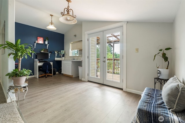 253 Kruger Rd Unit B, Onalaska, WA 98570 - home office with french doors, vaulted ceiling, and light wood-style floors