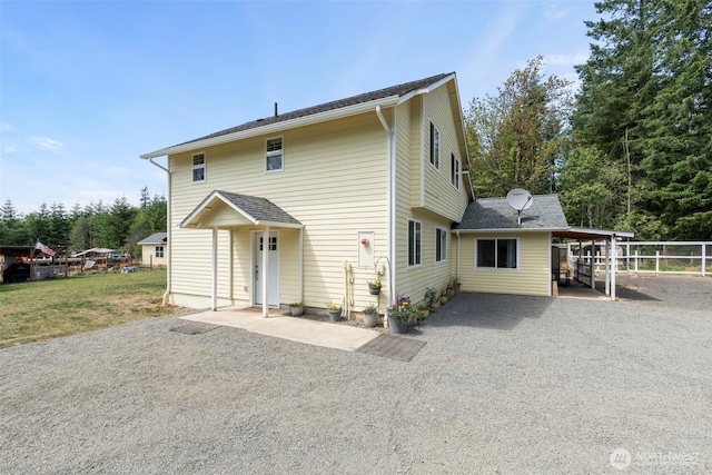 253 Kruger Rd Unit B, Onalaska, WA 98570 - back of house with gravel driveway