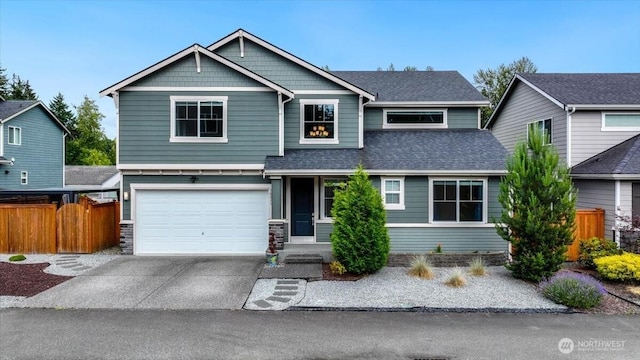 16311 5th Dr SE, Bothell, WA 98012 - craftsman inspired home featuring driveway, an attached garage, roof with shingles, and stone siding