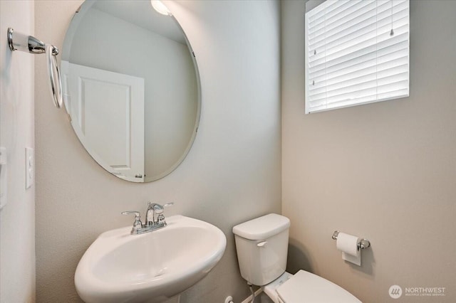 16311 5th Dr SE, Bothell, WA 98012 - half bathroom featuring a sink and toilet