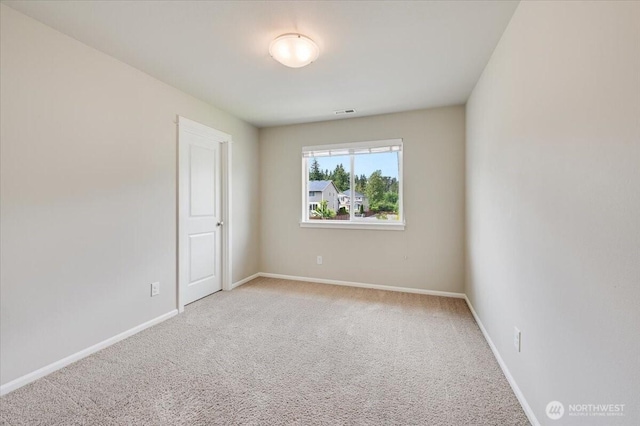 16311 5th Dr SE, Bothell, WA 98012 - carpeted spare room featuring baseboards