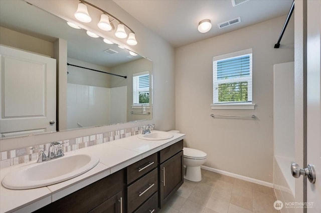 16311 5th Dr SE, Bothell, WA 98012 - full bath featuring double vanity, bathtub / shower combination, and tile patterned flooring