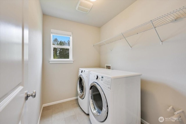 16311 5th Dr SE, Bothell, WA 98012 - laundry area with separate washer and dryer and baseboards