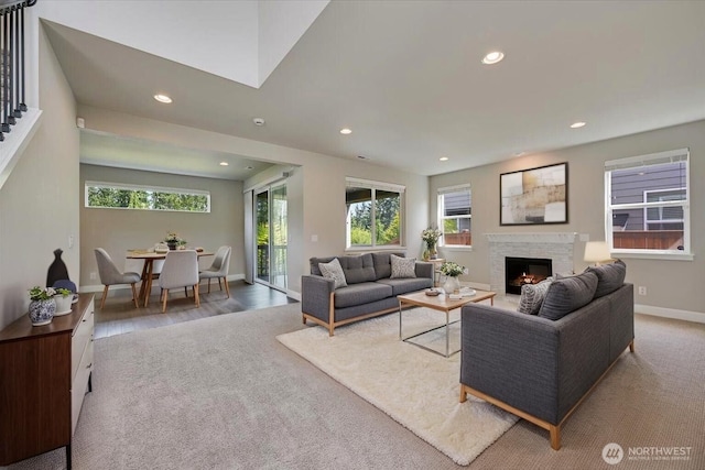 16311 5th Dr SE, Bothell, WA 98012 - living room featuring plenty of natural light, recessed lighting, a fireplace, and wood finished floors