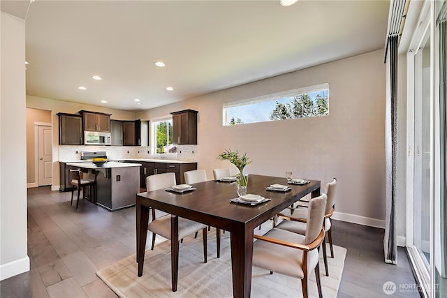 16311 5th Dr SE, Bothell, WA 98012 - dining area featuring light wood-type flooring and recessed lighting