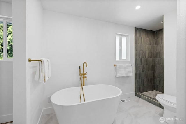 824 SW 301st Pl, Federal Way, WA 98023 - full bath with a freestanding tub, plenty of natural light, tiled shower, recessed lighting, and marble finish flooring