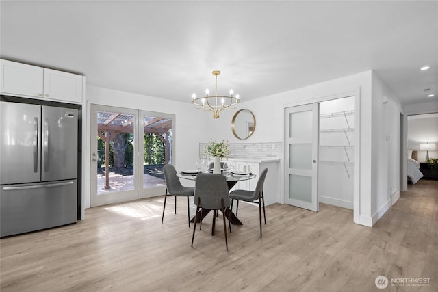824 SW 301st Pl, Federal Way, WA 98023 - dining area featuring a chandelier, light wood-style flooring, and recessed lighting