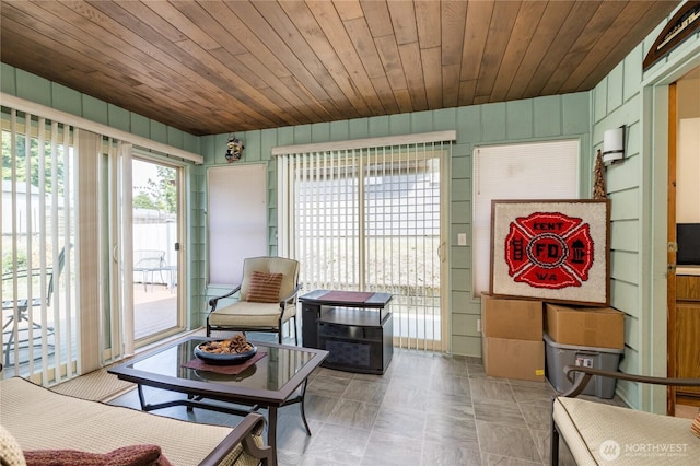 1023 E Maple St, Kent, WA 98030 - living area featuring wood walls and wood ceiling