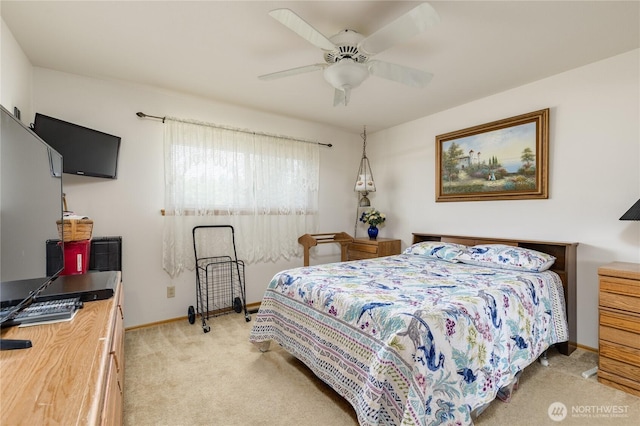 1023 E Maple St, Kent, WA 98030 - bedroom with light colored carpet and ceiling fan