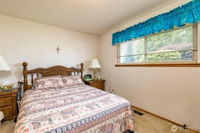 1023 E Maple St, Kent, WA 98030 - carpeted bedroom featuring baseboards