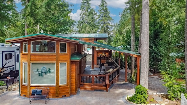 1546 Reservation Rd SE Unit 213, Olympia, WA 98513 - view of playground featuring view of wooded area