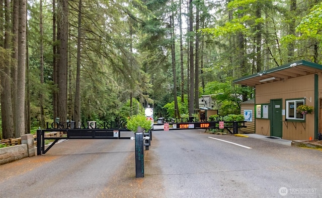 1546 Reservation Rd SE Unit 213, Olympia, WA 98513 - view of asphalt road with a gated entry