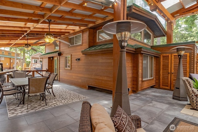 1546 Reservation Rd SE Unit 213, Olympia, WA 98513 - view of patio / terrace featuring a ceiling fan and outdoor dining space