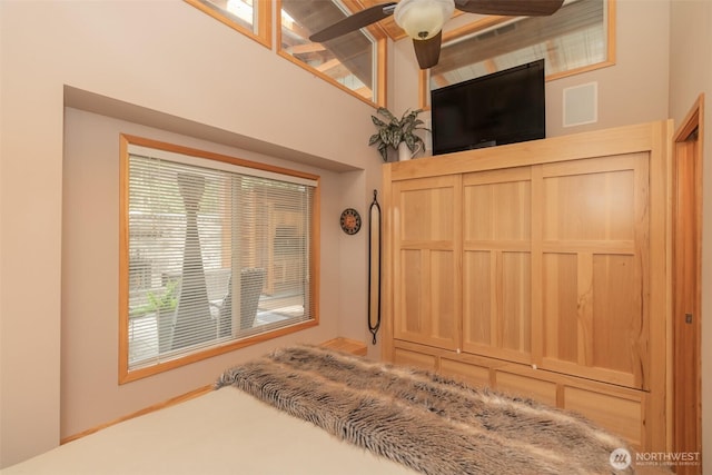 1546 Reservation Rd SE Unit 213, Olympia, WA 98513 - unfurnished bedroom featuring a towering ceiling