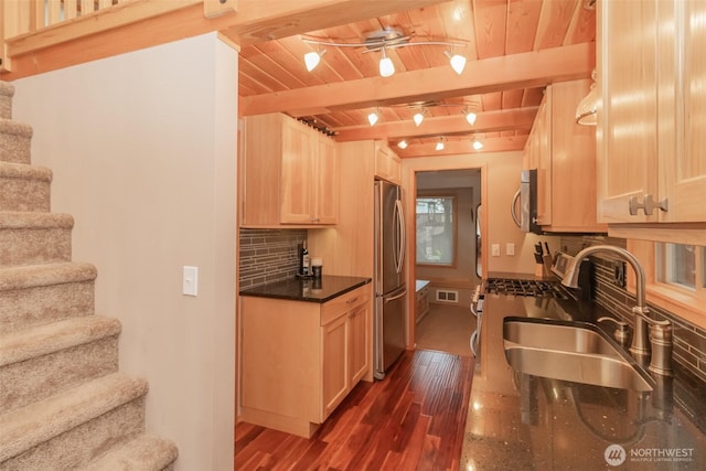 1546 Reservation Rd SE Unit 213, Olympia, WA 98513 - kitchen featuring a wood ceiling with exposed beams, dark wood-type flooring, stainless steel appliances, light brown cabinets, and decorative backsplash