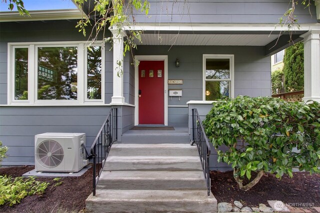 2433 E Valley St, Seattle, WA 98112 - doorway to property featuring covered porch