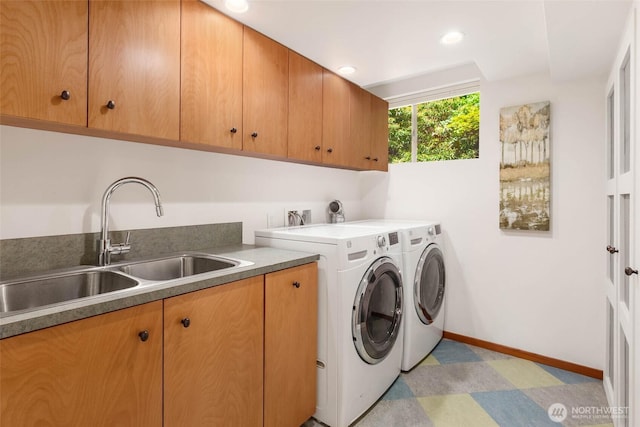 14460 NE 16th Pl, Bellevue, WA 98007 - laundry area with washer and clothes dryer, cabinet space, and light flooring