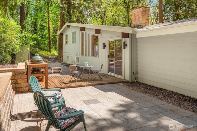 14460 NE 16th Pl, Bellevue, WA 98007 - view of patio / terrace featuring a deck and outdoor dining space