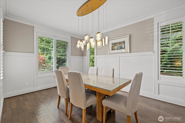 8132 NE 117th Pl, Kirkland, WA 98034 - dining space with a chandelier, dark wood-style floors, a decorative wall, wainscoting, and crown molding